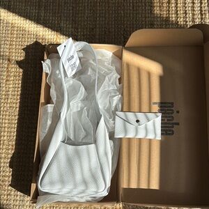 Handmade genuine leather white purse with matching leather wallet. New with tags